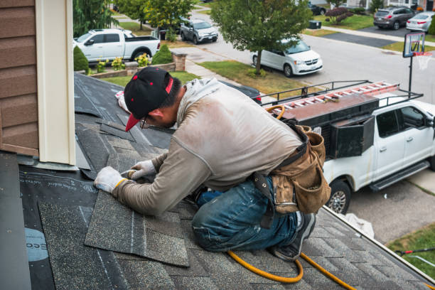 Professional Roofing technician working in Steilacoom, WA